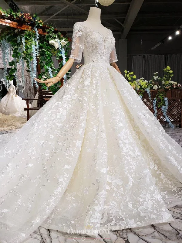 women's lace-up dressesModest Princess Ball Gown Wedding Dress With Half Sleeves OW413